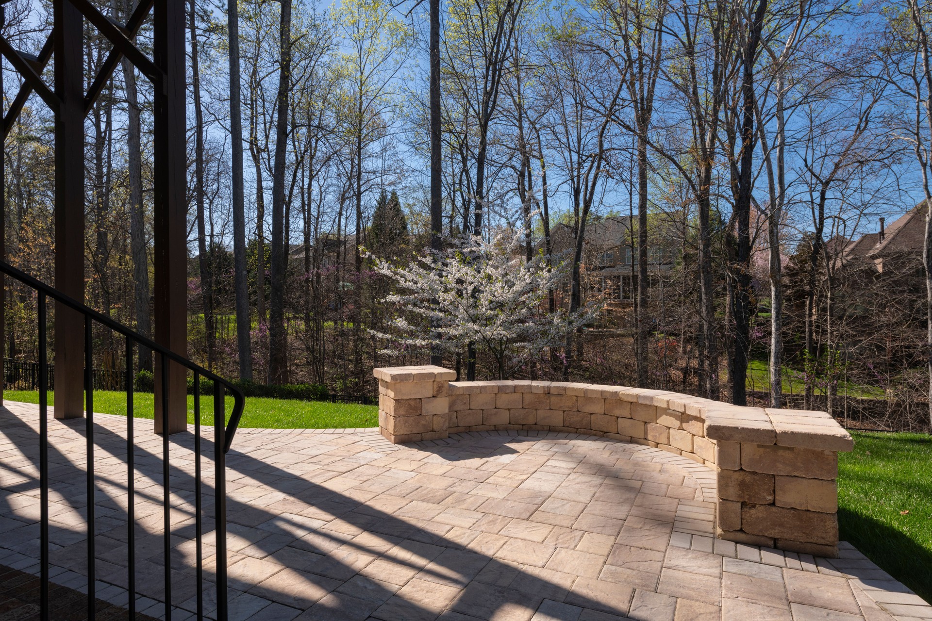 Backyard View with Concrete Pavers in the Springtime